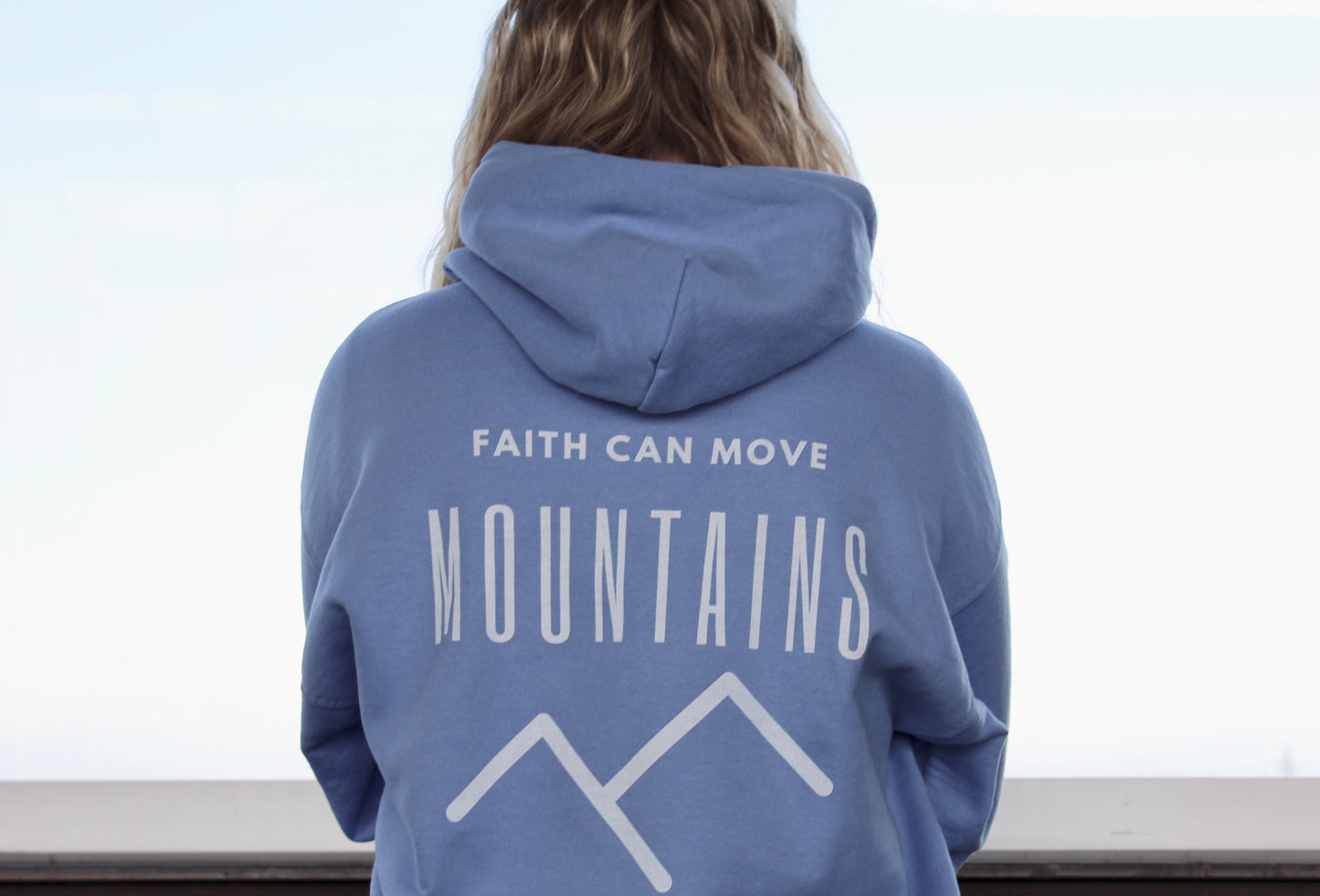 FAITH MOVES MOUNTAINS UNISEX HOODIE